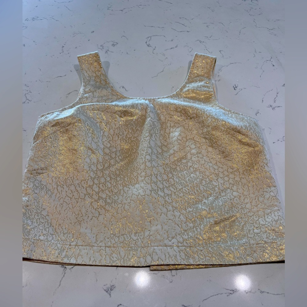 Made for Impulse crop tank with back button closure. Size M